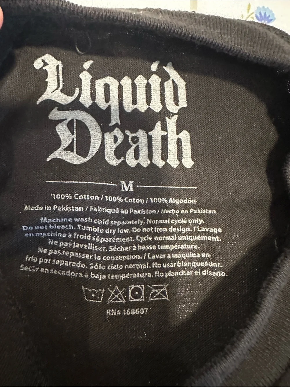 Liquid Death Sz:M Instant Death black/ white Melting Flaming Skull graphic Tee.